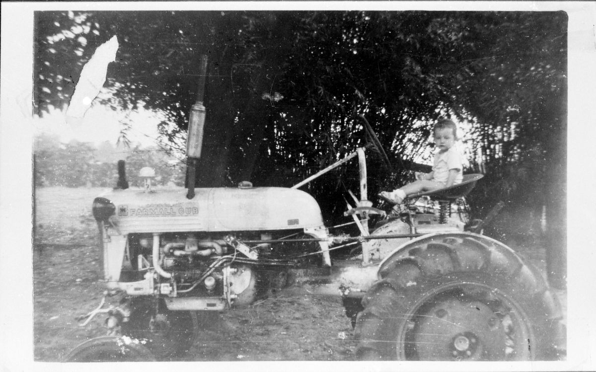 Betty Fraleigh (O'Toole) sitting on tractor - Madison, Florida