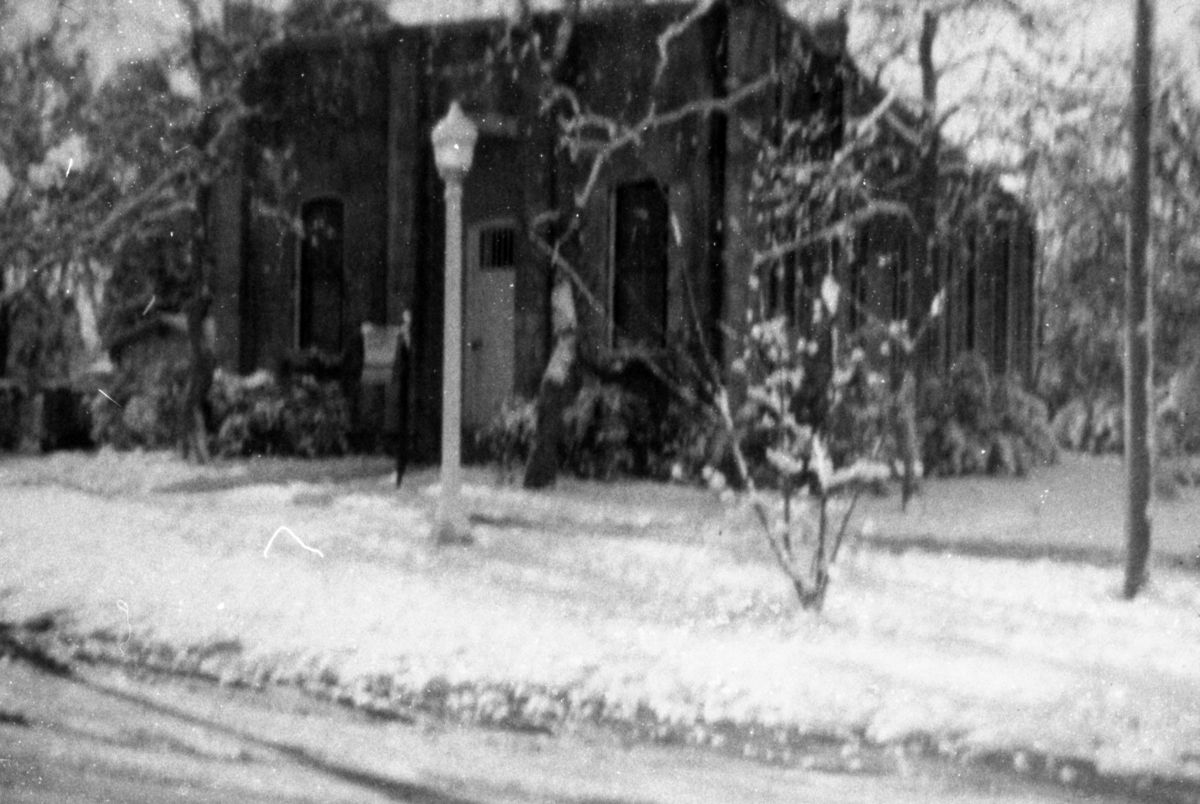 Old 1888 jail with snow - Madison, Florida.