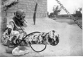 Man in diving suit posing next to cannon at McKee's Museum of Sunken Treasure - Plantation Key, Florida