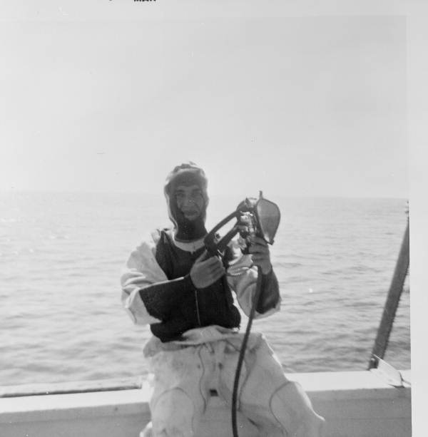 Treasure hunter Burt Webber putting on his diving suit
