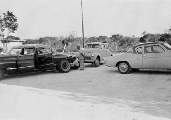Unidentified men changing a tire