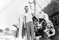 Art McKee's son, Wayne, posing near the entrance to his father's museum - Plantation Key, Florida