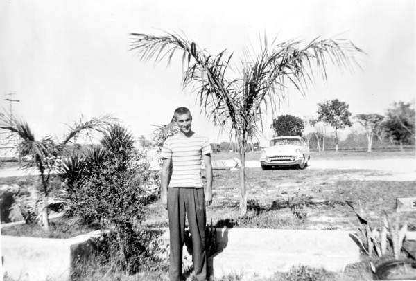Art McKee's son, Wayne, posing at his father's museum - Plantation Key, Florida
