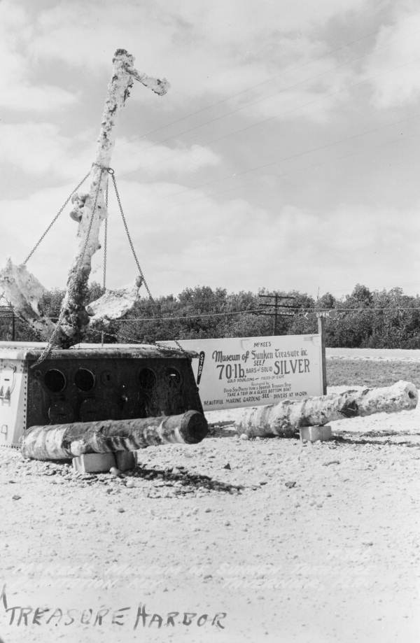 Postcard of first museum sign, anchor & cannons.
