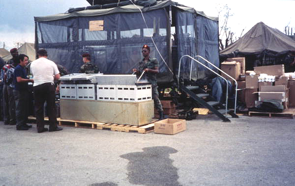 Hurricane Andrew victims receiving food aid from the military in Dade County, Florida.