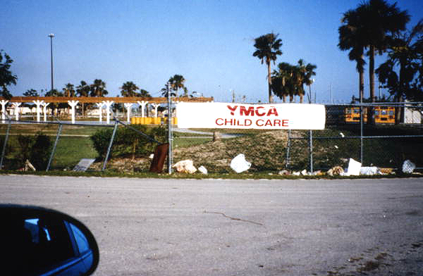 View of YMCA child care banner following Hurricane Andrew in Dade County, Florida.