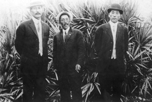 Three Japanese American men posing for a picture (ca. 1913)