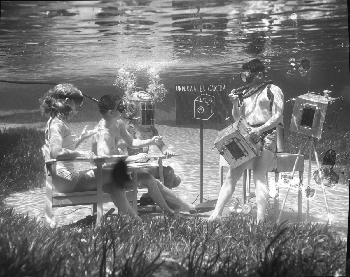 Photographer Bruce Mozert teaching underwater camera training school at Silver Springs.