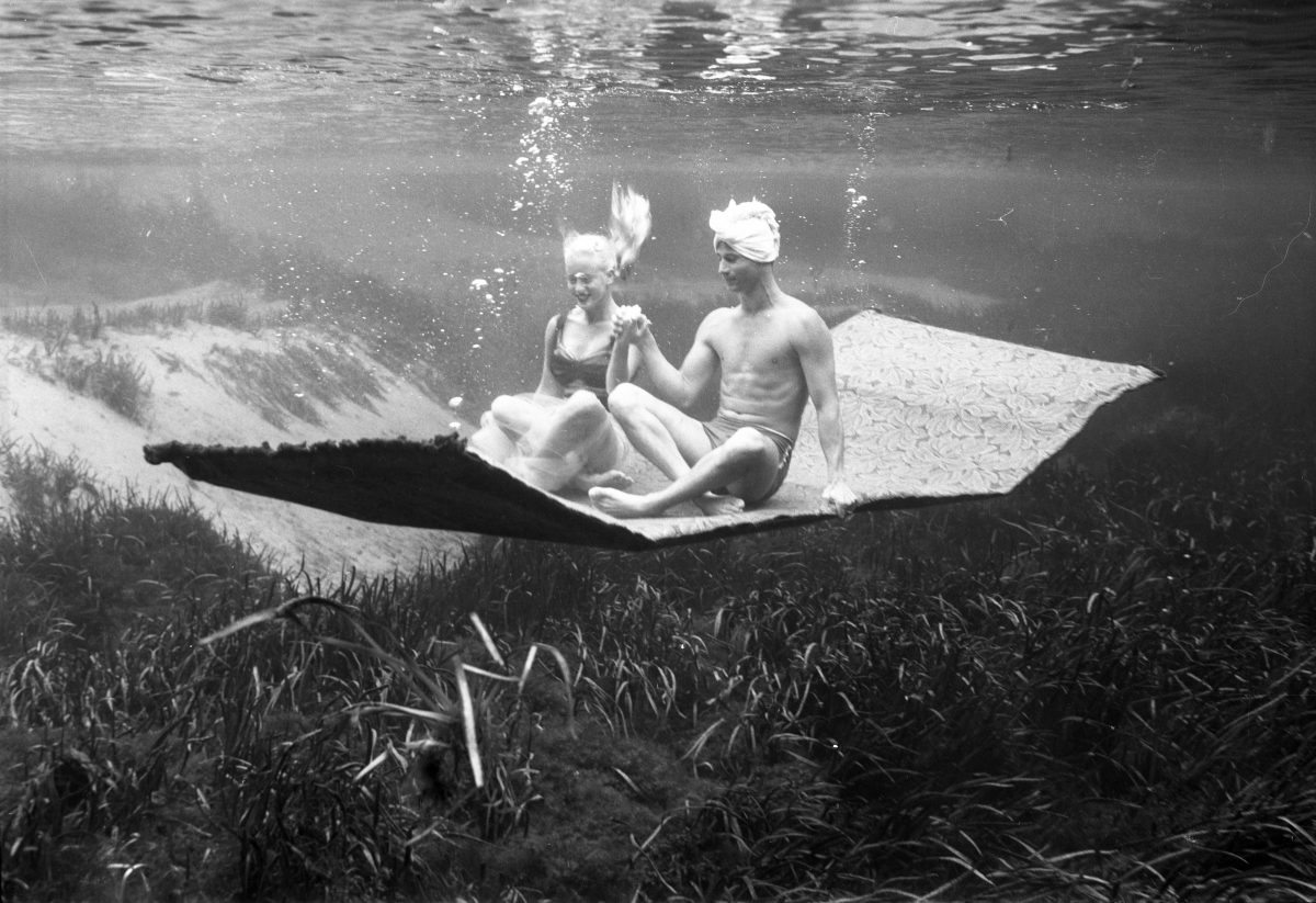 Couple on a magic underwater carpet ride at Silver Springs.