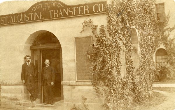Clerks in front of the Office of the St. Augustine Transfer Company.