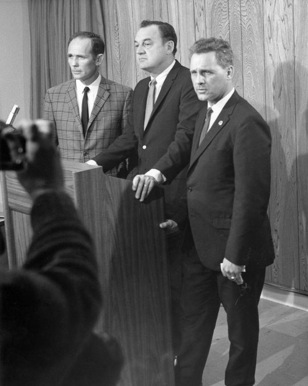 Governor Claude Kirk at a news conference with FEA Executive Secretary Phil Constans and President Dexter Hagman.