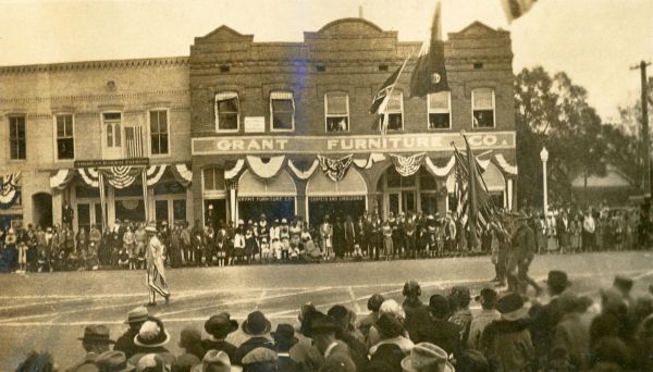 Uncle Sam leading color guards in the Tallahassee centennial celebration parade.