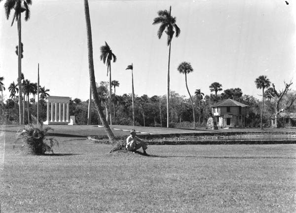 Visitor in front of the Barron Collier Memorial and blockhouse visitor center at Collier-Seminole State Park - Collier County, Florida