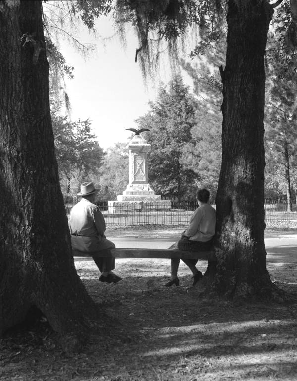 Couple looking at monument at Natural Bridge Battlefield Historic State Park - Woodville, Florida