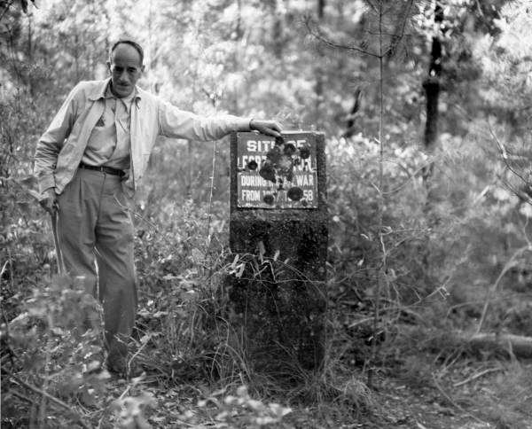 Man with historical marker for Fort Payton - St. Johns County, Florida