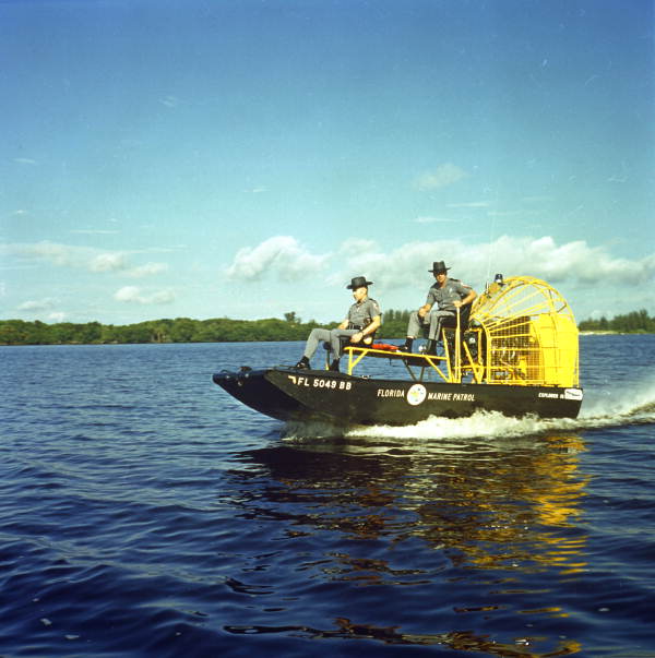 Florida Marine Patrol officers in patrol airboat
