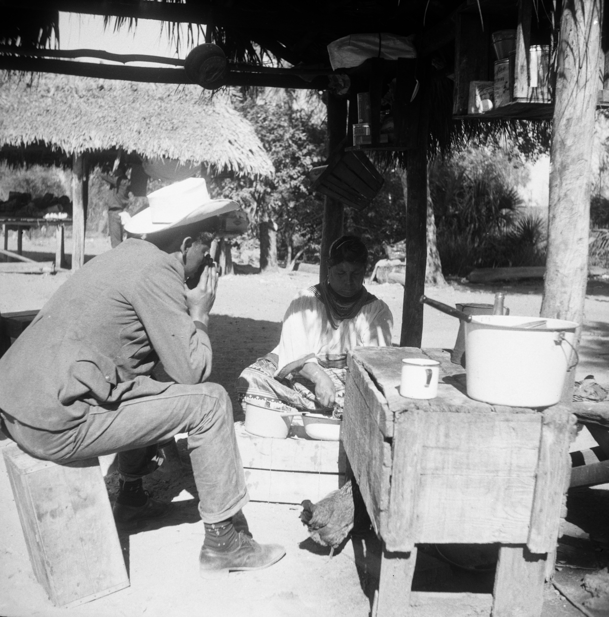 Seminole woman Alice Wilson preparing the ducks her son has killed