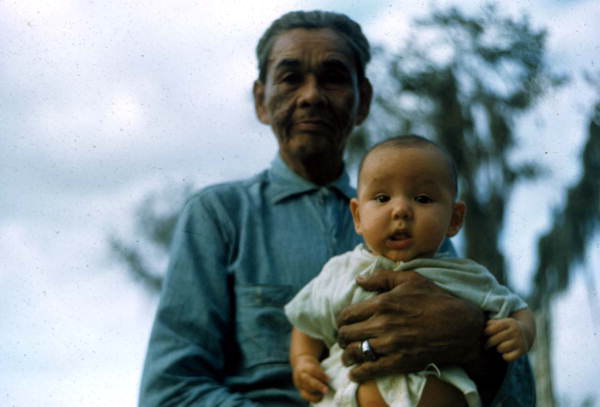 Portrait of a Seminole Indian grandfather and child