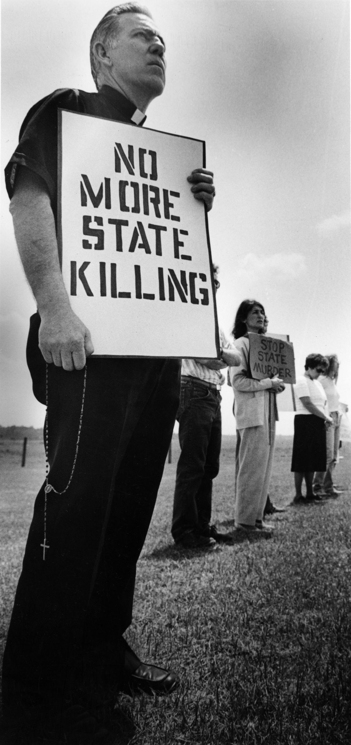 Ernie Brunelle protesting the execution of Daniel Morris Thomas.