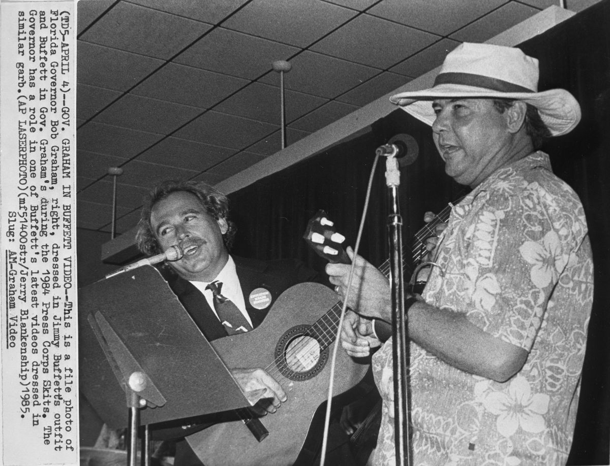 Florida Governor Bob Graham performing a skit with Jimmy Buffett
