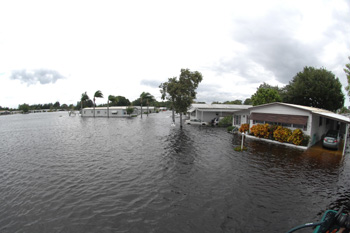 View of flooding from Tropical Storm Fay at the Lamplighter Village mobile home park in Melbourne, Fla.