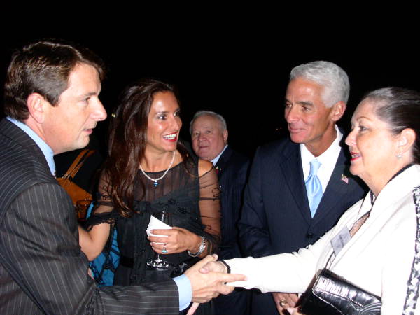 View showing Governor Charlie Crist and his girlfriend Carole Rome at a reception.