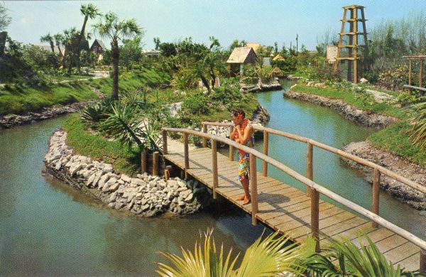 Woman on a bridge at Tiki Gardens in Indian Rocks Beach.