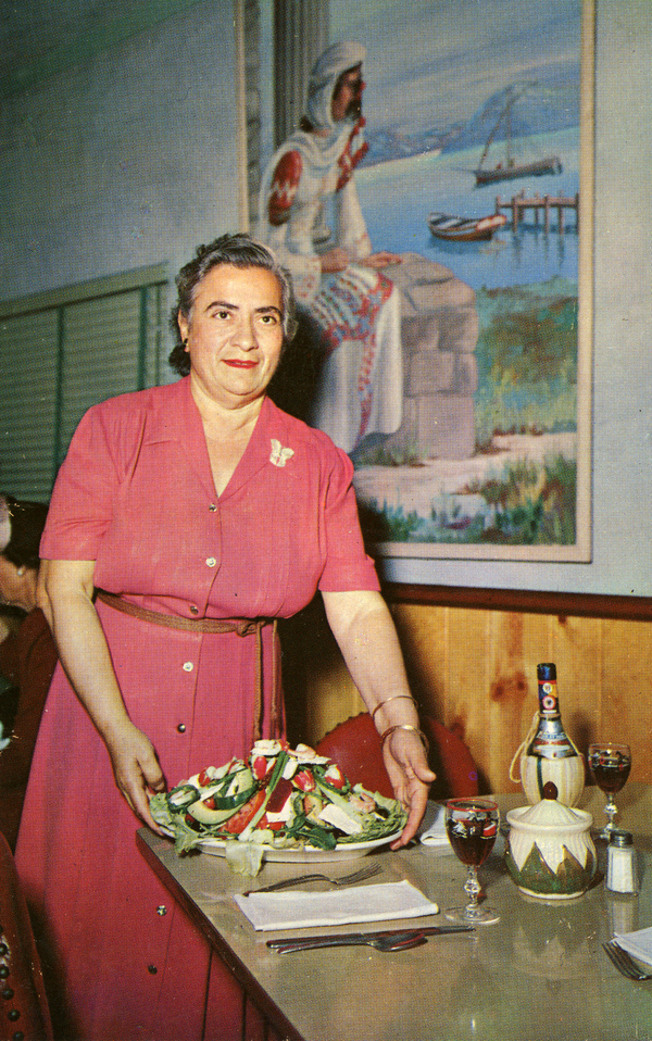 Maria Pappas with Greek salad at Louis Pappas' Riverside Restaurant in Tarpon Springs.