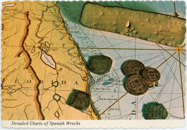 Coins and gold bar on detailed chart of Spanish wrecks at the Real Eight Museum of Sunken Treasure.