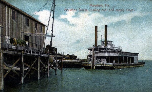 Marathon docks, loading coal and supply barges - Marathon, Florida