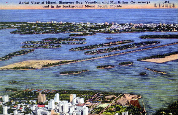 Aerial view of Miami, Biscayne Bay, Venetian and MacArthur causeways and in the background Miami Beach - Florida.