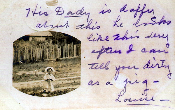 Child posing for photograph