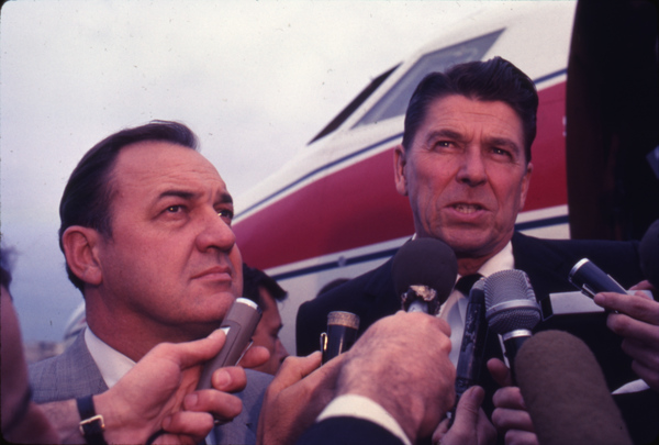 Florida Governor Claude Kirk, left, with California Governor Ronald Reagan talking to the press.