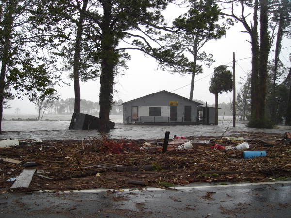 Flooding of Davis Seafood with debris during Hurricane Dennis in Apalachicola, Florida.
