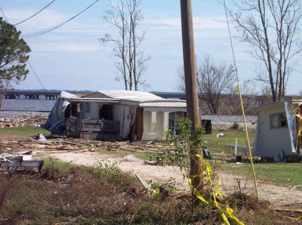 Storm damaged mobile home along U.S. 90 Scenic Highway in Pensacola, Florida.