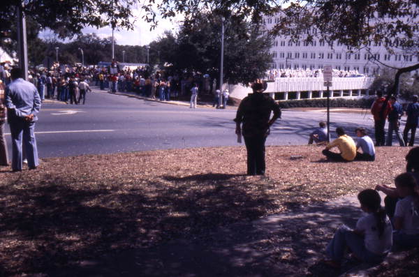 Crowds waiting for KKK marching rally on South Monroe Street in Tallahassee, Florida.