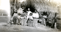 Portrait of Hazel and Doc Engelbert with Seminoles at a Seminole Indian Village in Florida.