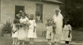 Portrait of an African American bride with bridesmaid and flower girls in Hibernia.
