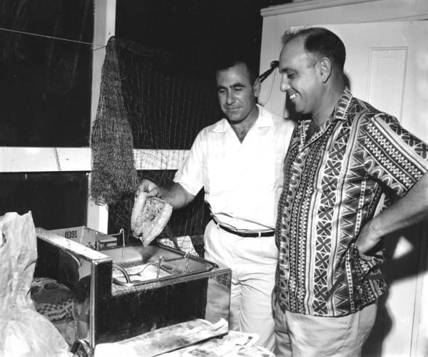 Anthony Toranto and Jerry Allen frying fish - Apalachicola, Florida