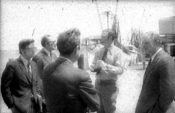 Men on a dock - Apalachicola, Florida.