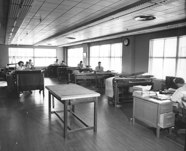 Eastern airline employees at desks