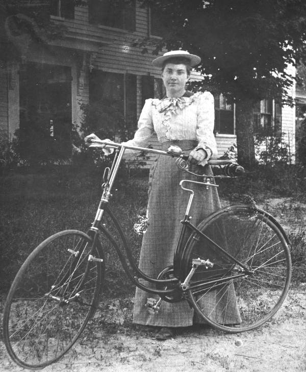 Mrs. E. N. Spinney and her bicycle