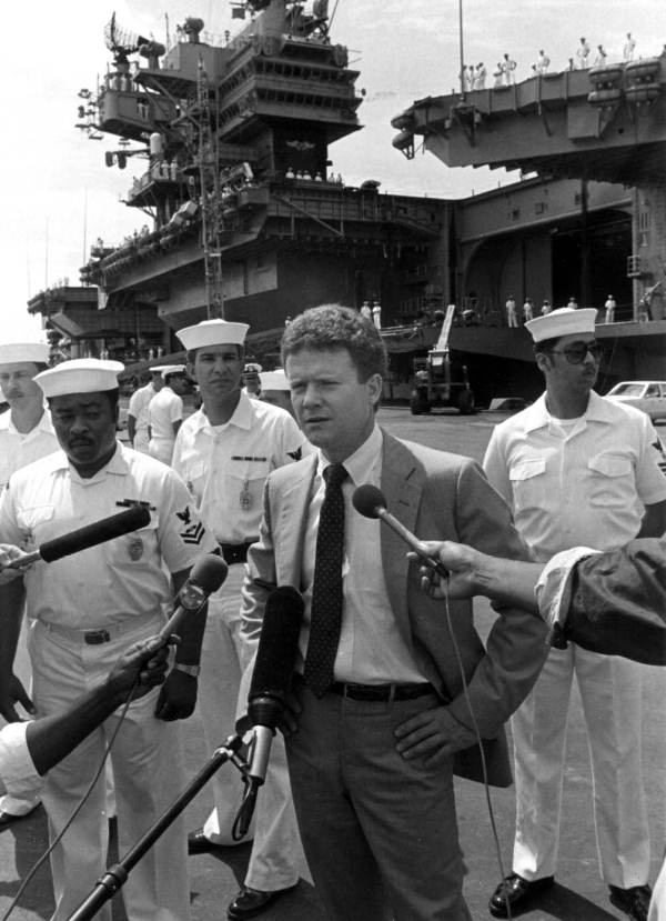 Mr. James H. Webb talking to press.