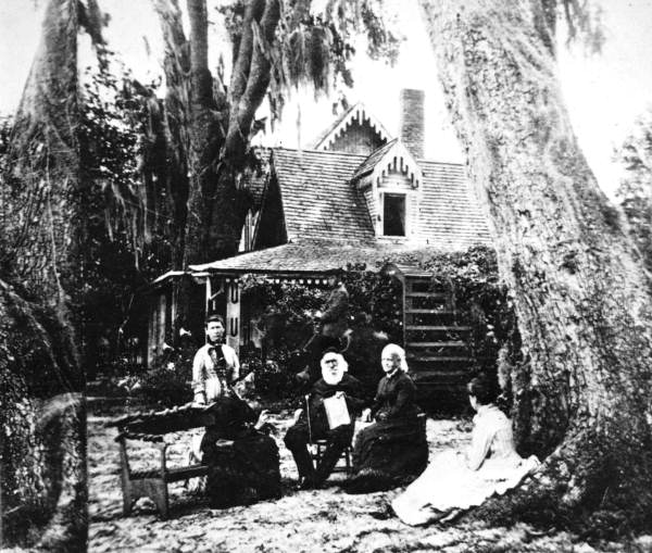 Stowe family in front of their home.