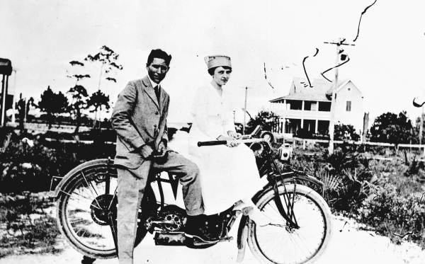 Two people on a motorcycle