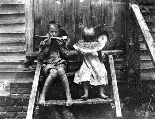 Davis and Martha Godard on stairs