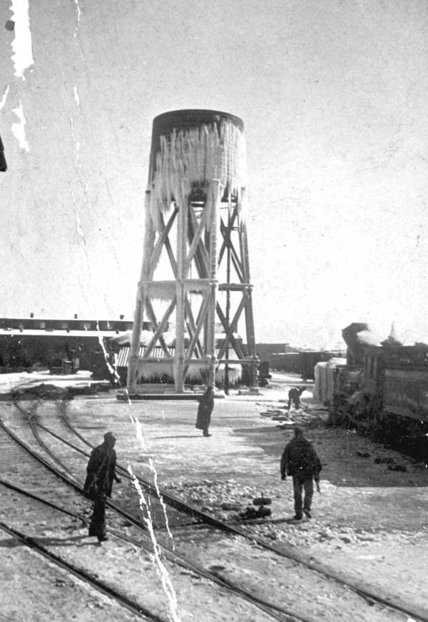 Water tank and shop yards in Pensacola after the snow.