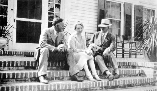 Alfred B. Maclay, Louise Maclay (Mrs. Alfred Maclay), and Dandy Dinmont at their home in Killearn Gardens - Tallahassee, Florida.