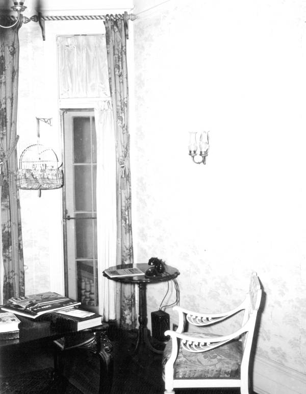 Chair by a telephone table