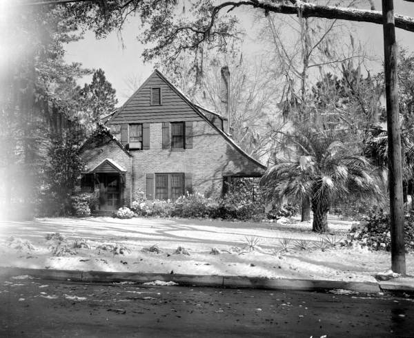 Brick house covered in snow - Tallahassee, Florida.